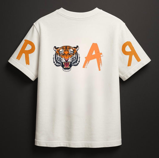 White t-shirt with a tiger graphic and 'R O A R' text on a dark background